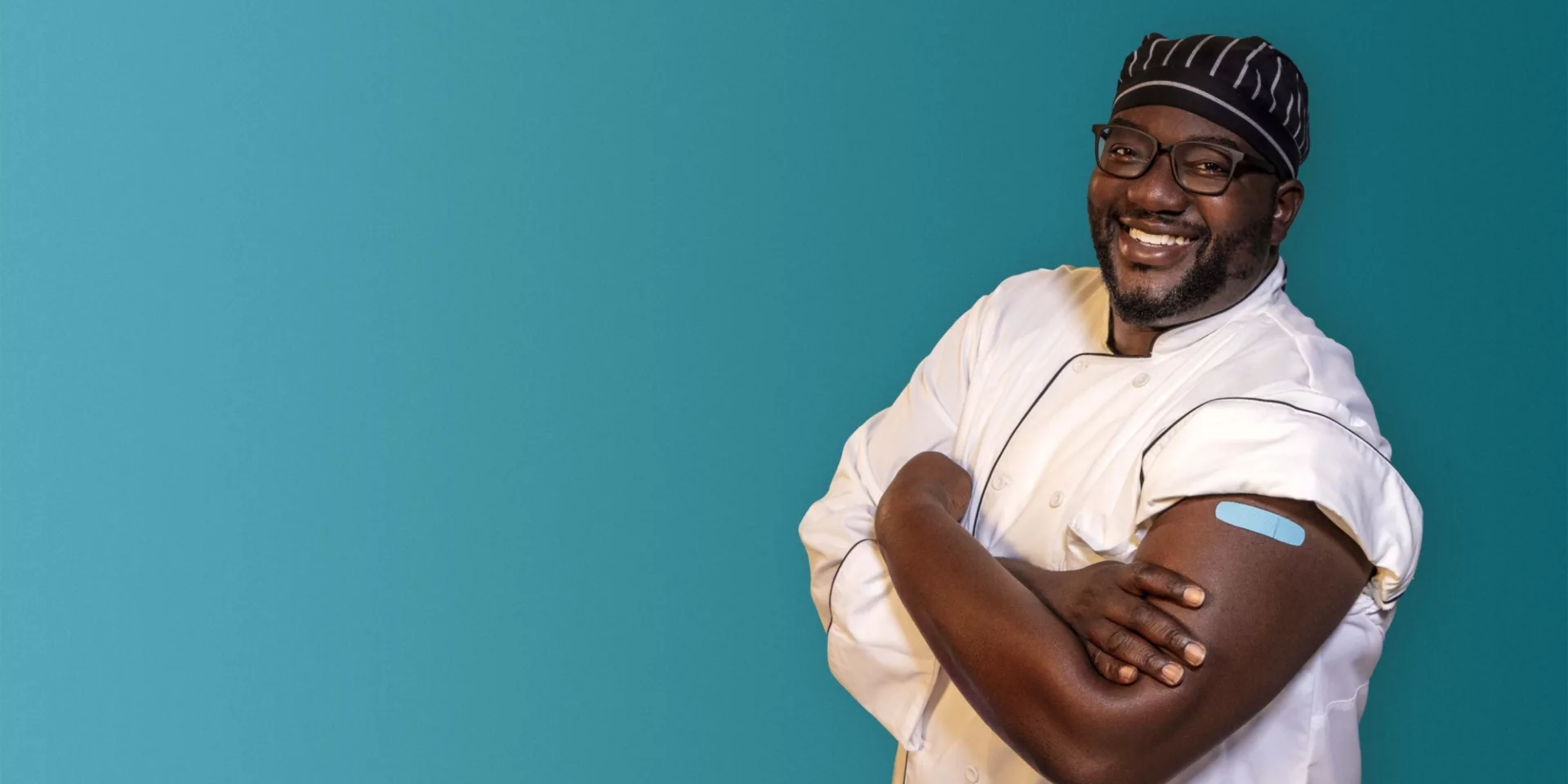 smiling male doctor with his flu shot